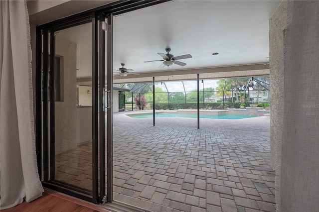 interior space with a ceiling fan