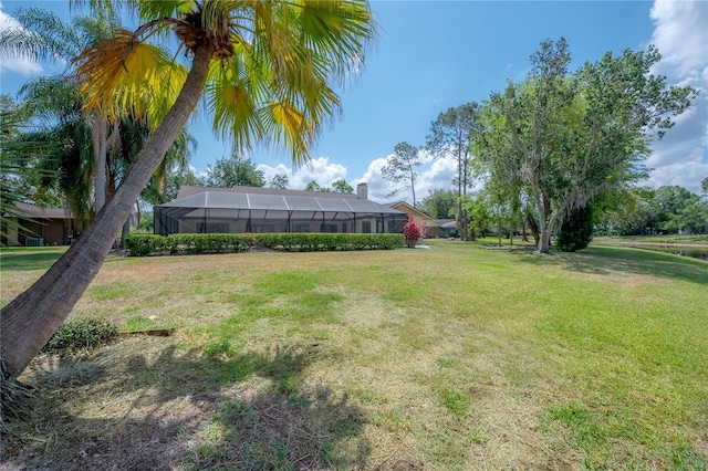 view of yard featuring a lanai