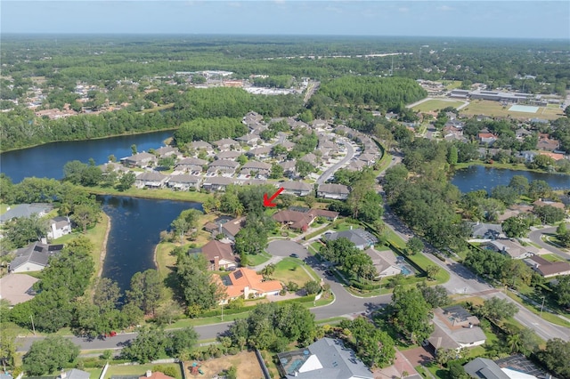 aerial view featuring a water view and a residential view