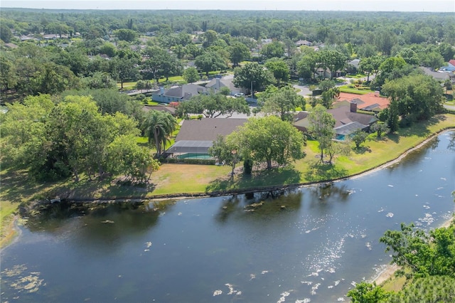 bird's eye view featuring a water view and a residential view