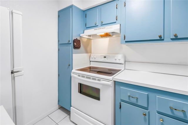 250 Medallion Blvd Unit H, Madeira Beach, FL 33708 - kitchen featuring blue cabinets, under cabinet range hood, white appliances, and light countertops