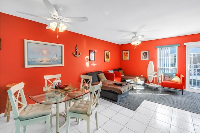 250 Medallion Blvd Unit H, Madeira Beach, FL 33708 - dining area with baseboards, a ceiling fan, and light tile patterned floors