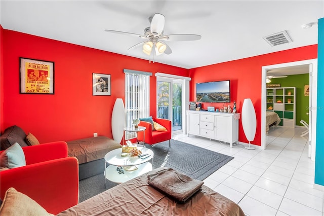 250 Medallion Blvd Unit H, Madeira Beach, FL 33708 - living area featuring visible vents, a ceiling fan, and tile patterned flooring