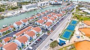 250 Medallion Blvd Unit H, Madeira Beach, FL 33708 - birds eye view of property featuring a water view