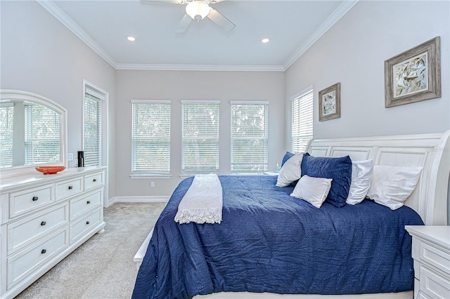 bedroom with crown molding, ceiling fan, recessed lighting, and light colored carpet