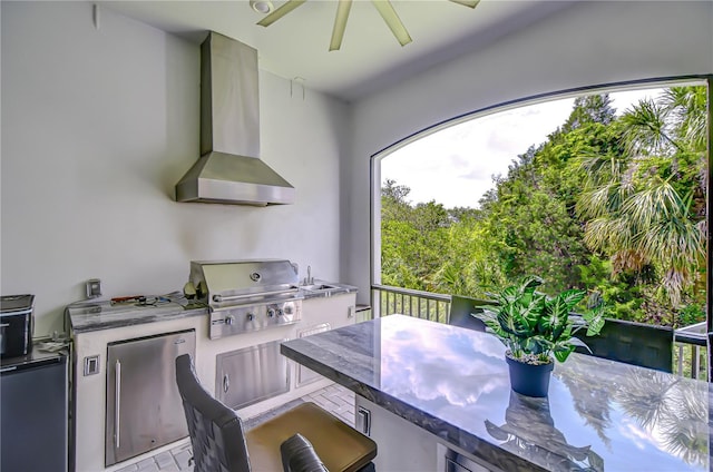 view of patio featuring a ceiling fan, outdoor dining space, a grill, and area for grilling