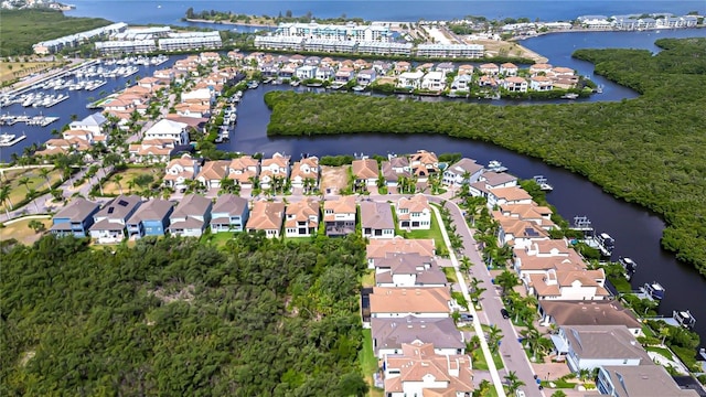 aerial view featuring a water view and a residential view