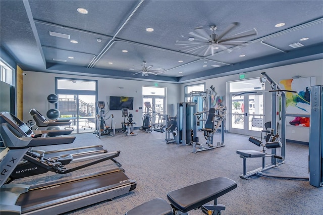 workout area with recessed lighting, carpet, a wealth of natural light, and french doors