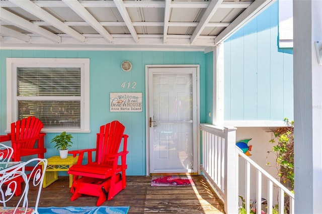 entrance to property featuring a porch