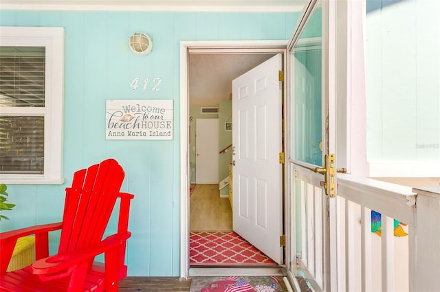 entrance to property featuring visible vents