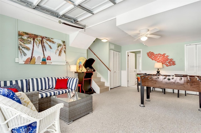 game room featuring a ceiling fan and carpet flooring