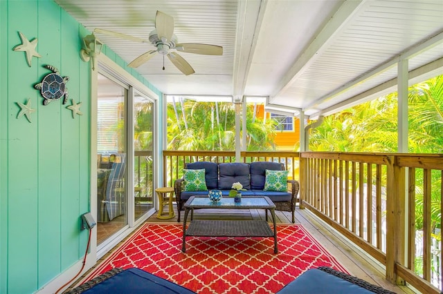 exterior space with ceiling fan and an outdoor living space