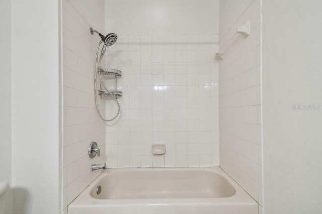 full bathroom with shower / tub combination