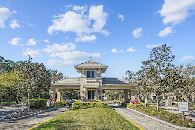 exterior space featuring driveway and a carport