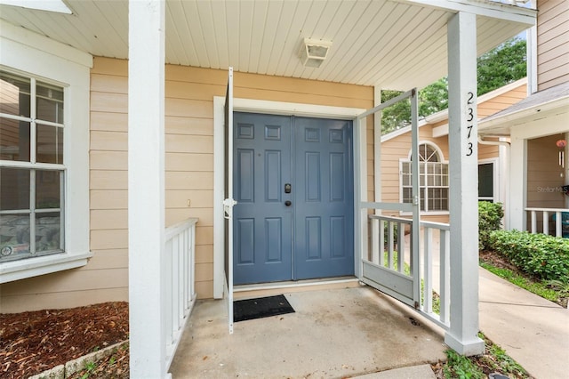2373 Hounds Trl, Palm Harbor, FL 34683 - entrance to property featuring covered porch