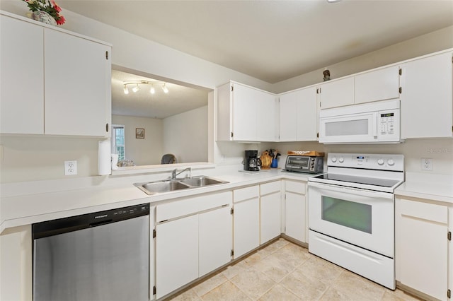 2373 Hounds Trl, Palm Harbor, FL 34683 - kitchen featuring a toaster, white appliances, light countertops, white cabinetry, and a sink