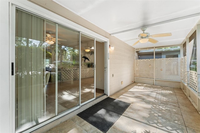 2373 Hounds Trl, Palm Harbor, FL 34683 - unfurnished sunroom with a ceiling fan