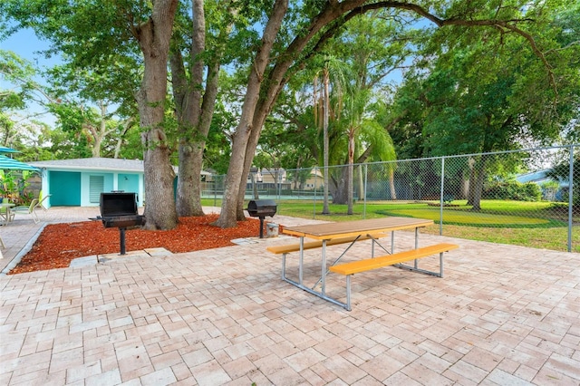 2373 Hounds Trl, Palm Harbor, FL 34683 - exterior space featuring fence, a patio, and a lawn