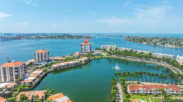 birds eye view of property featuring a water view