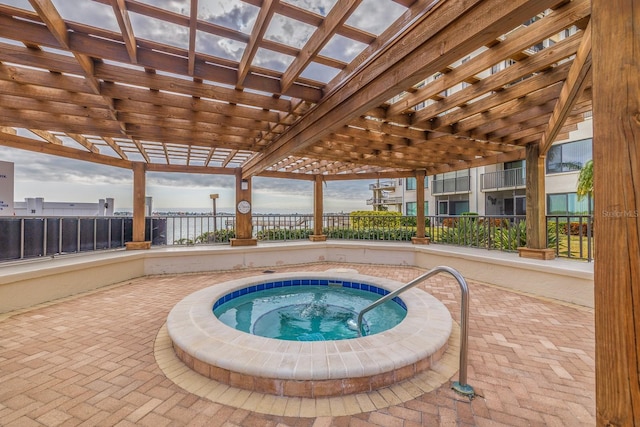 view of pool featuring a pergola and a community hot tub