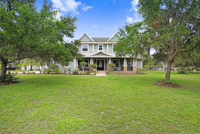 18929 Crescent Rd, Odessa, FL 33556 - view of front of property with covered porch and a front yard
