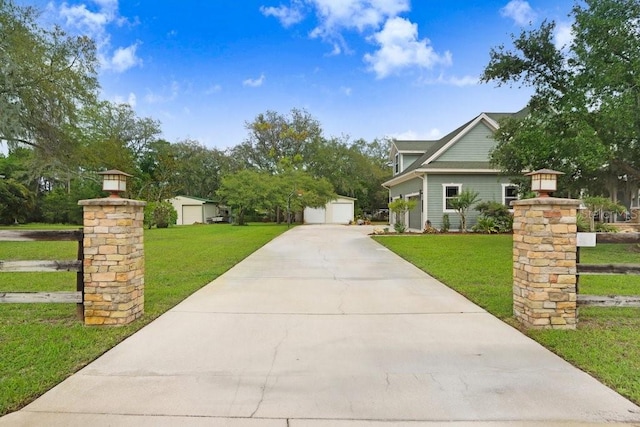18929 Crescent Rd, Odessa, FL 33556 - view of front of house with a detached garage and an outbuilding
