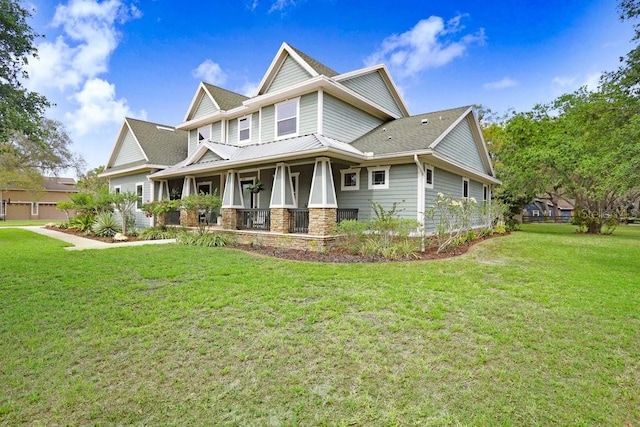 18929 Crescent Rd, Odessa, FL 33556 - view of front of property featuring a porch, a front lawn, and stone siding