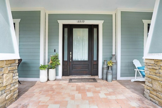 18929 Crescent Rd, Odessa, FL 33556 - entrance to property with a porch