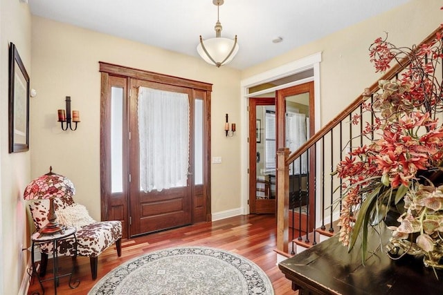 18929 Crescent Rd, Odessa, FL 33556 - foyer with wood finished floors, stairs, and baseboards
