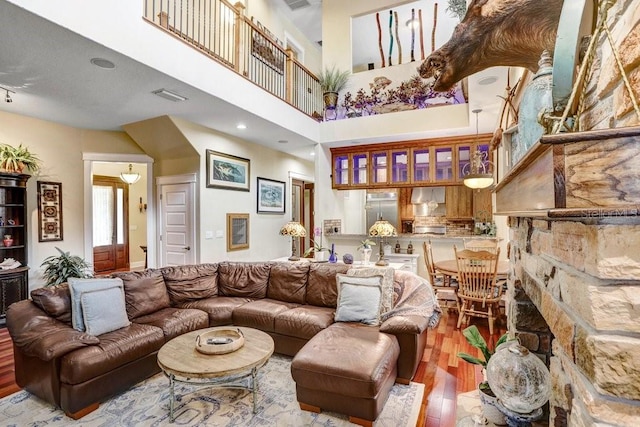 18929 Crescent Rd, Odessa, FL 33556 - living area featuring wood-type flooring and a towering ceiling