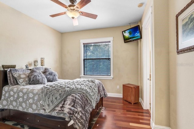 18929 Crescent Rd, Odessa, FL 33556 - bedroom featuring wood finished floors, baseboards, and ceiling fan