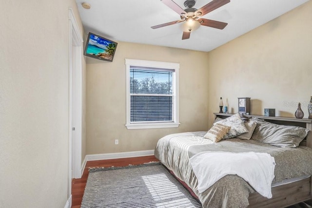 18929 Crescent Rd, Odessa, FL 33556 - bedroom featuring wood finished floors, baseboards, and a ceiling fan