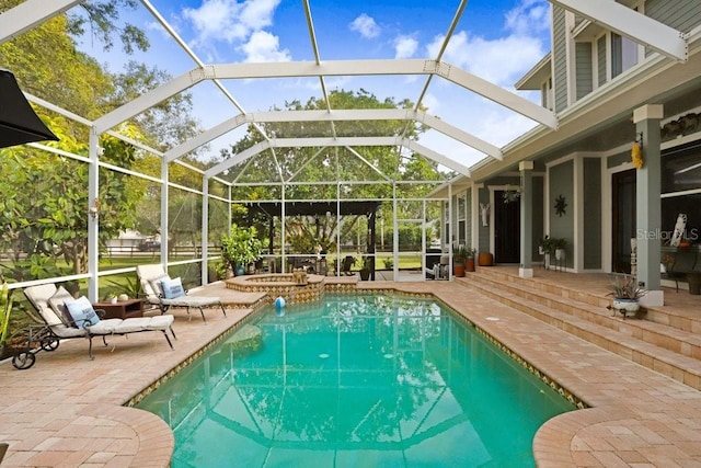 18929 Crescent Rd, Odessa, FL 33556 - outdoor pool with a patio area, a hot tub, and a lanai