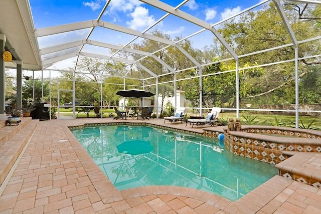 18929 Crescent Rd, Odessa, FL 33556 - outdoor pool with a patio area and glass enclosure