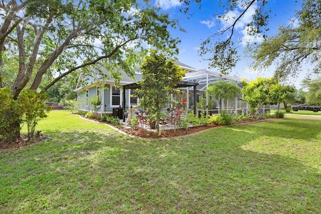 18929 Crescent Rd, Odessa, FL 33556 - view of grassy yard with a lanai