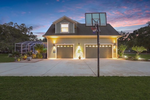 18929 Crescent Rd, Odessa, FL 33556 - view of front of home with driveway, a garage, and a yard