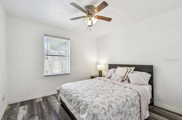1247 21st St, Sarasota, FL 34234 - bedroom featuring wood finished floors, baseboards, and ceiling fan