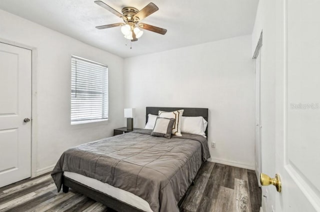 1247 21st St, Sarasota, FL 34234 - bedroom with wood finished floors, ceiling fan, and baseboards
