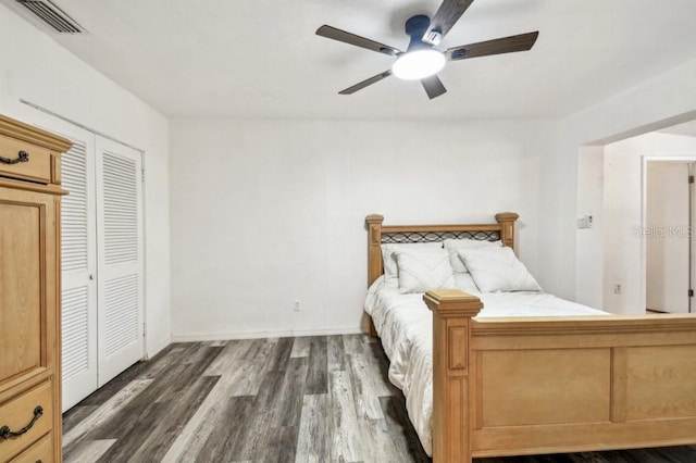 1247 21st St, Sarasota, FL 34234 - bedroom with wood finished floors, a closet, and ceiling fan