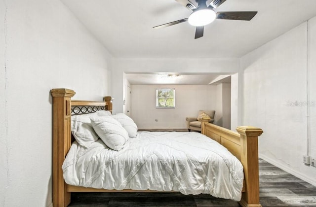 1247 21st St, Sarasota, FL 34234 - bedroom with wood finished floors, baseboards, and ceiling fan