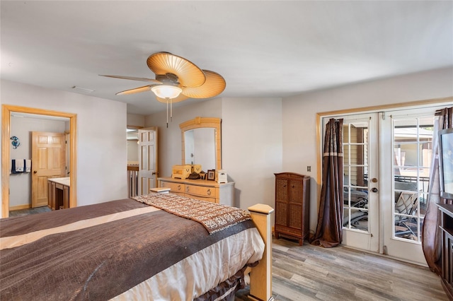 bedroom with access to outside, a ceiling fan, and light wood-style floors