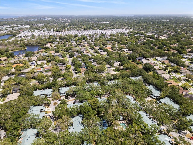 aerial view with a residential view and a water view