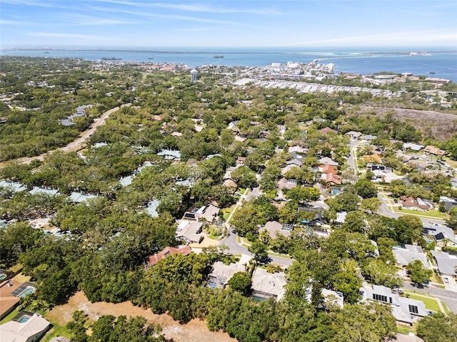 bird's eye view with a water view and a residential view