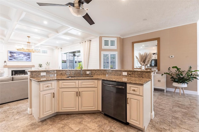 kitchen with cream cabinets, ceiling fan, a sink, dishwasher, and open floor plan