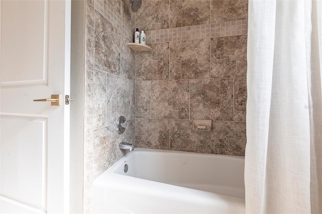full bathroom with shower / bath combo with shower curtain