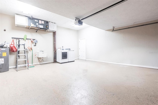garage featuring washer / clothes dryer, a sink, a garage door opener, and electric water heater