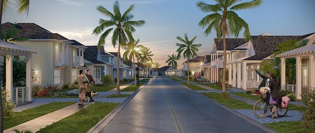 view of road with sidewalks and a residential view
