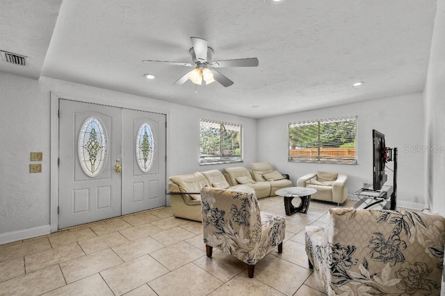 2026 Cocoanut Ave, Sarasota, FL 34234 - living area featuring light tile patterned flooring, visible vents, recessed lighting, a ceiling fan, and baseboards