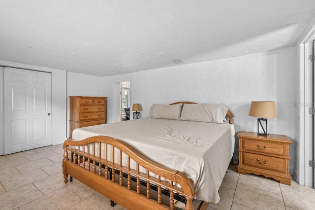 2026 Cocoanut Ave, Sarasota, FL 34234 - bedroom with light tile patterned floors