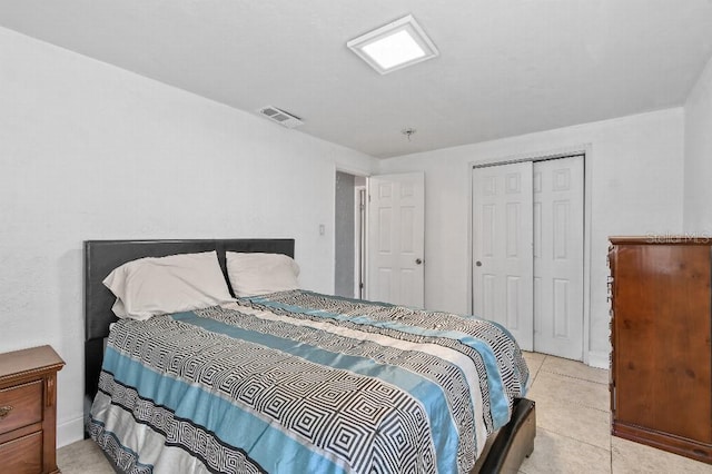 2026 Cocoanut Ave, Sarasota, FL 34234 - bedroom featuring a closet, visible vents, and light tile patterned flooring